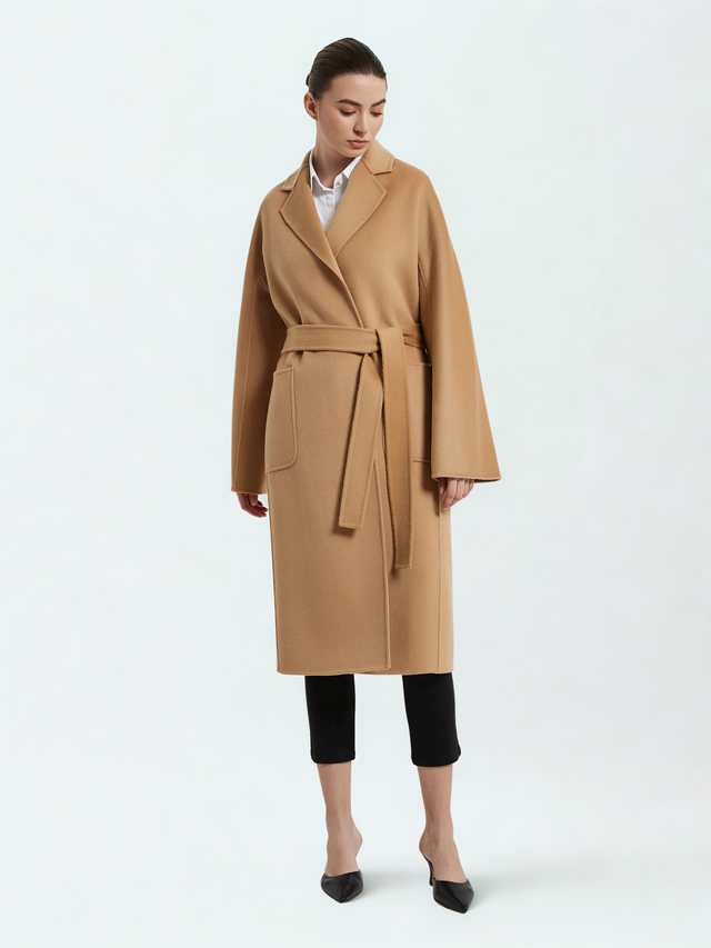 Woman wearing a beige coat on a white background