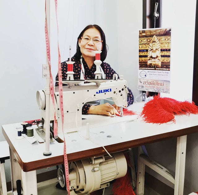 craftswoman with sewing machine