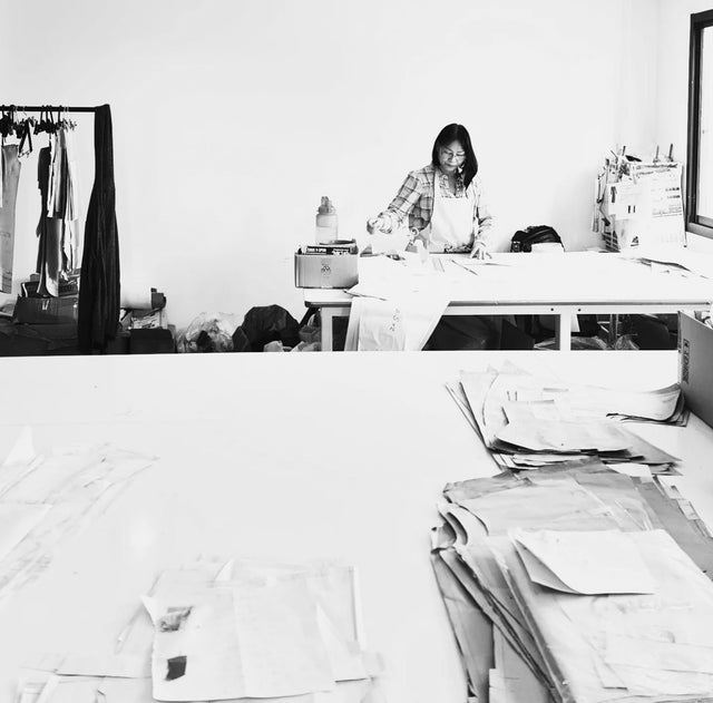 Woman at work in fashion atelier